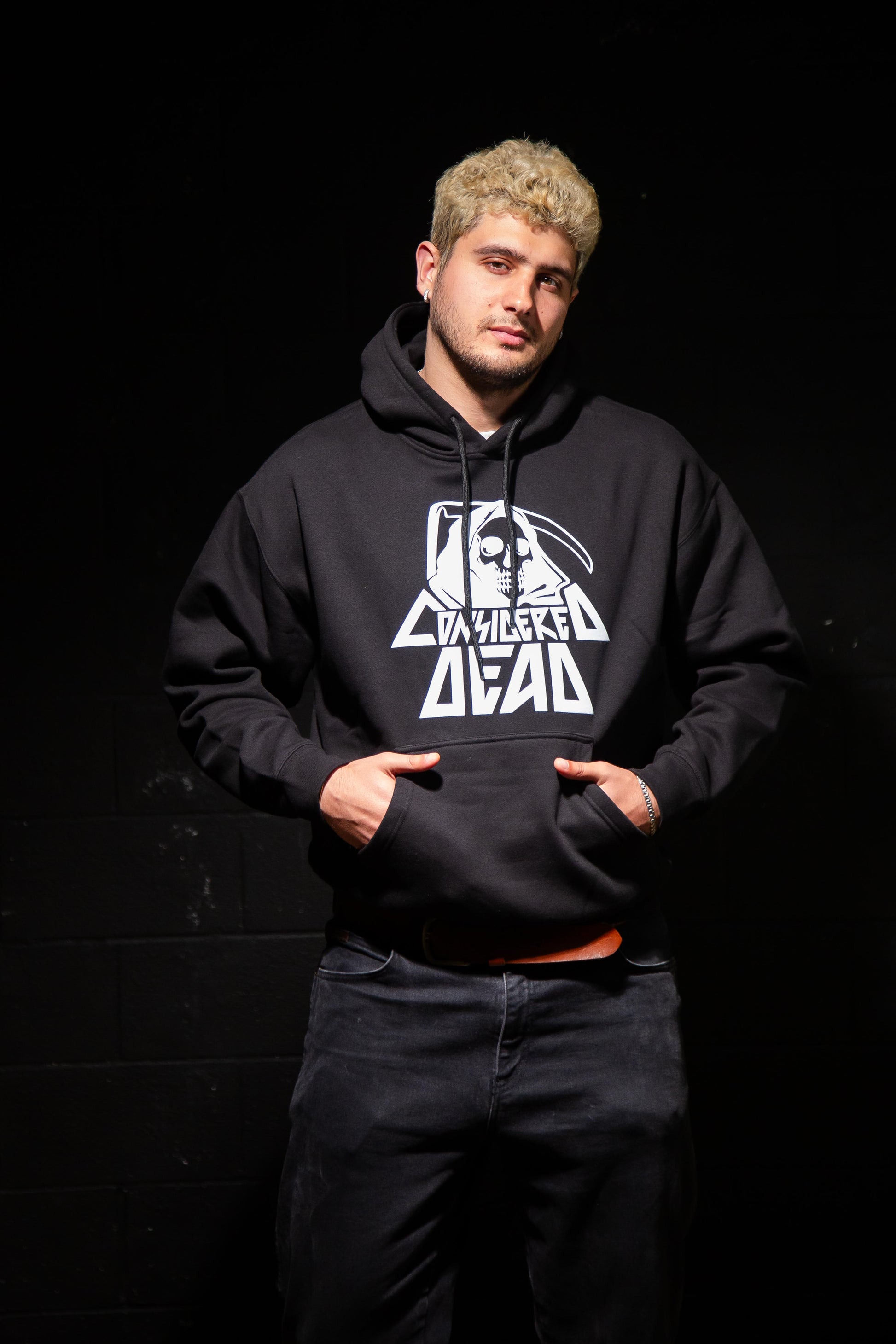 Considered Dead Core Heavy Hoodie in black with a white classic logo on the chest.